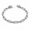 Silver bracelet with clear gemstones on a white background