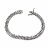 Silver bracelet with cubic zirconia stones on a white background