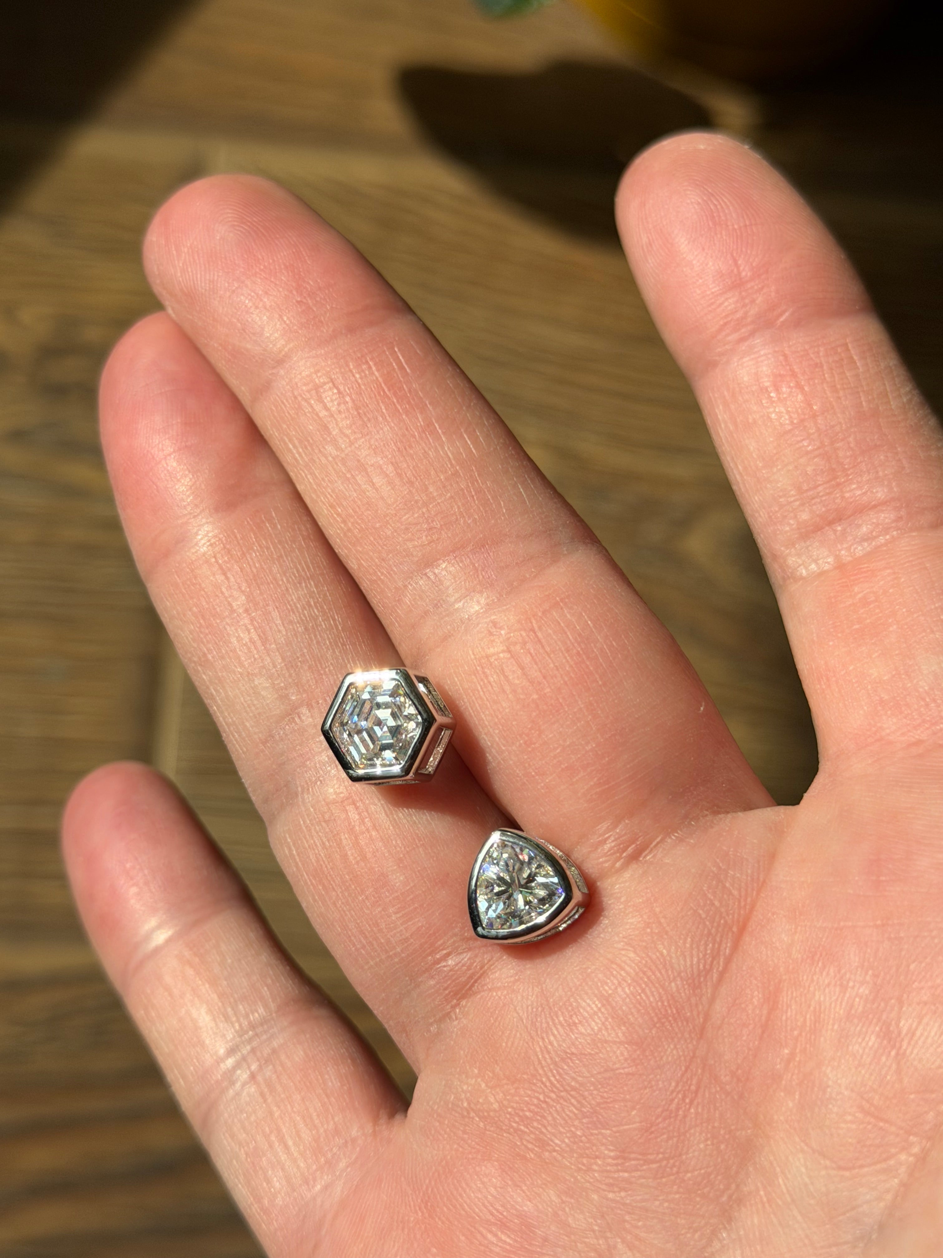 Silver asymmetric earrings with moissanite stone