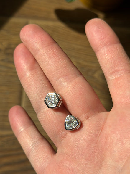 Silver asymmetric earrings with moissanite stone