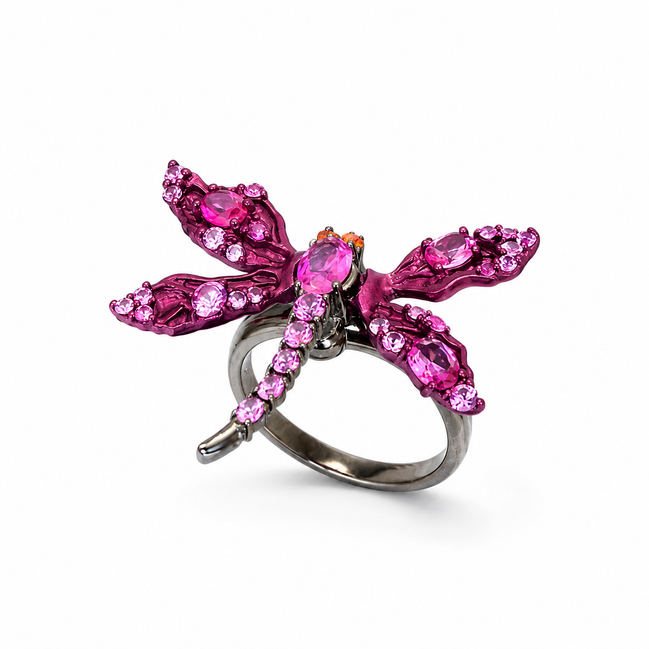 Jewelry ring with pink gemstones on a white background