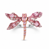 Pink dragonfly-shaped sterling silver ring with gemstones on a white background