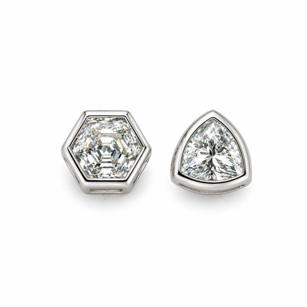 Silver asymmetric earrings with moissanite stone