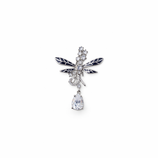 A silver, dragonfly inspired pendant with white zirconia stones and black enamel on the wings.
