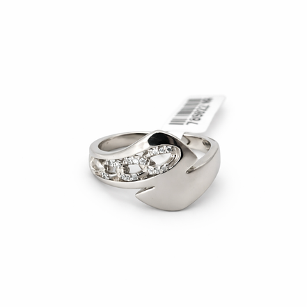 Silver ring with embedded cubic zirconia stones on a white background