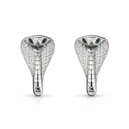 Silver cobra head earrings on a white background