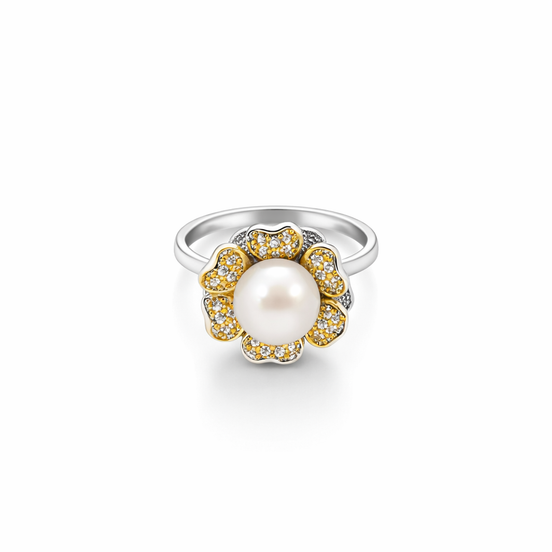 Silver ring with a pearl and gold accents on a white background