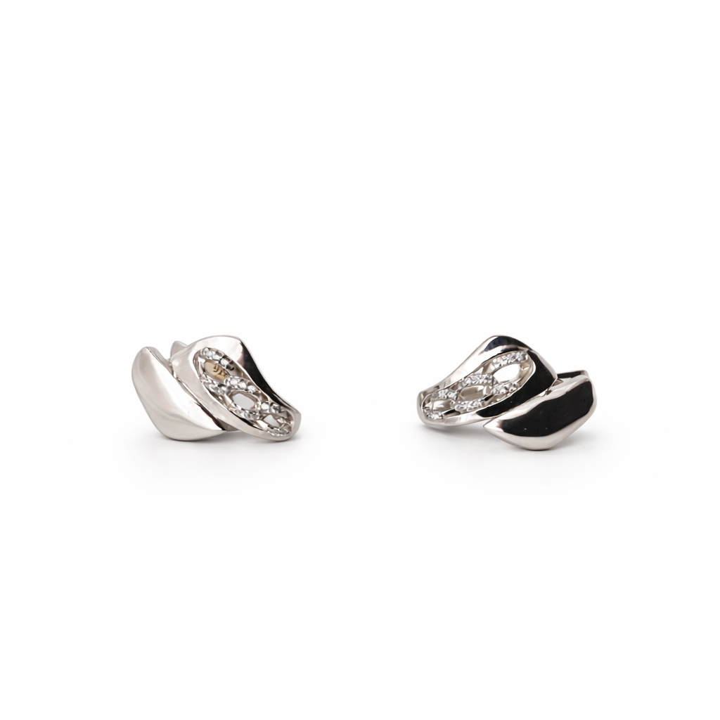 Pair of silver earrings with gemstones on a white background