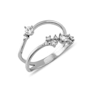 White gold ring with cubic zirconia accents on a white background