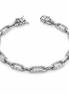 Silver bracelet with clear gemstones on a white background