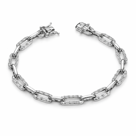 Silver bracelet with clear gemstones on a white background