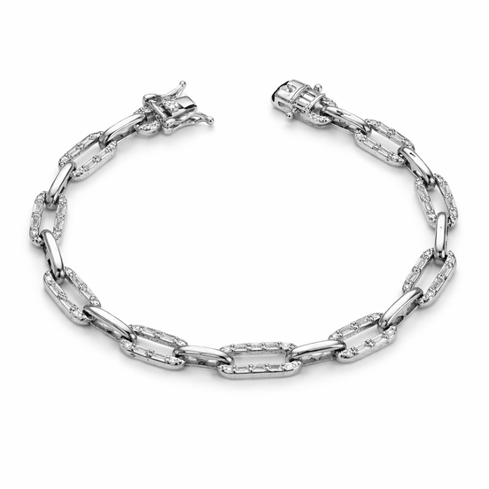 Silver bracelet with clear gemstones on a white background