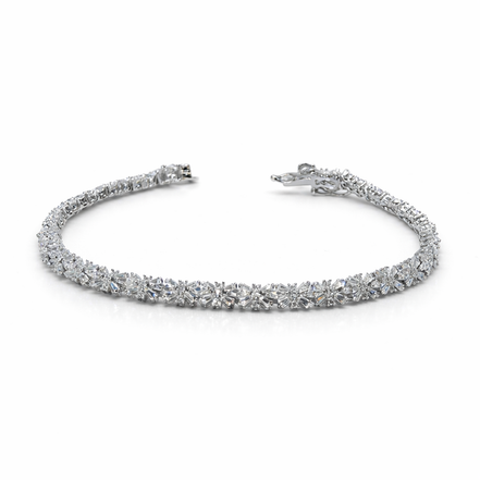 Silver bracelet with clear stones on a white background