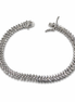 Silver bracelet with cubic zirconia stones on a white background